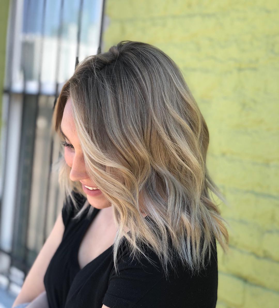 Side view of medium hairstyle with balayage