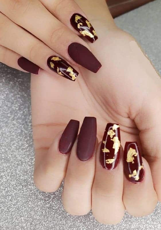 maroon and gold coffin nails