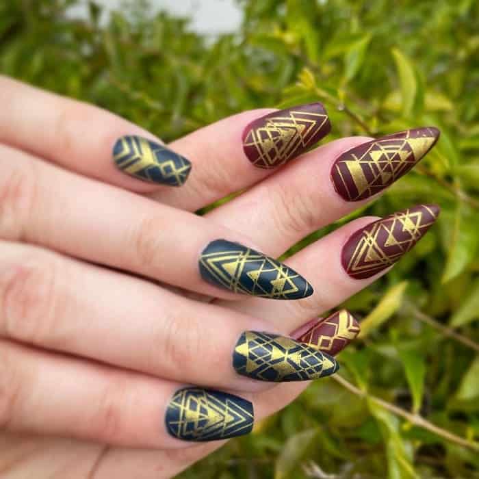 maroon and gold matte nails