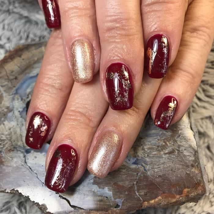maroon and rose gold nails