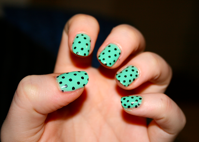 Mint nails with black polka dots