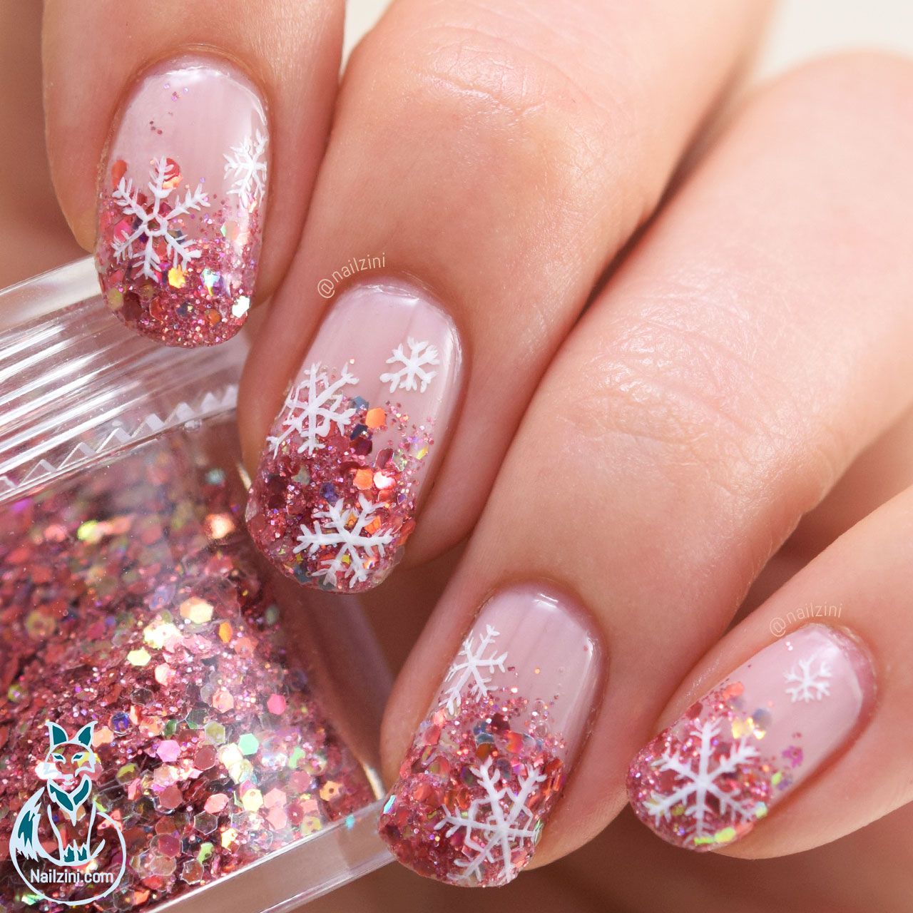 Rose gold glitter with snowflakes nails