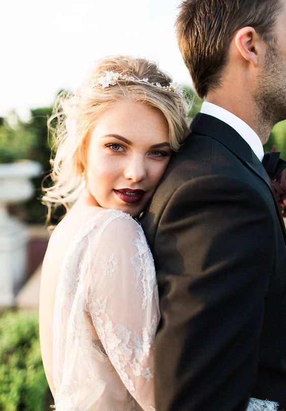 a dark berry lip and black smokeys are right what you need for a dramatic bridal look