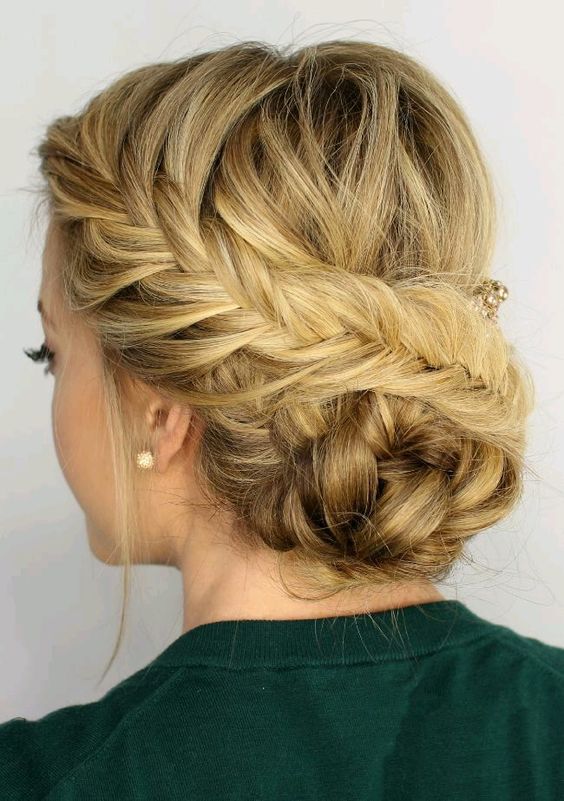 a fishtail braid halo updo with locks down is ideal for a boho bride and looks unique