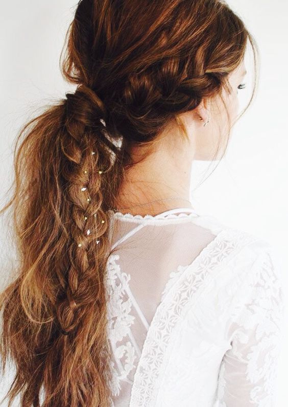 a fishtail braid of two parts and some loose hair for a casual and relaxed look