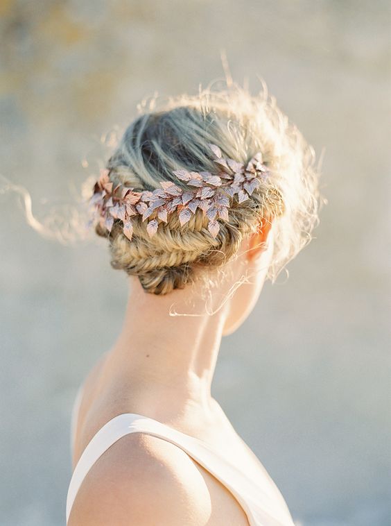 a delicate twisted braid with some bangs looks very chic and subtle, it's perfect for boho brides and can be accessorized with blooms