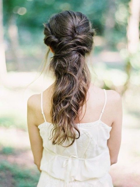 a twisted and wavy half updo will fit many bridal looks, from boho to rustic
