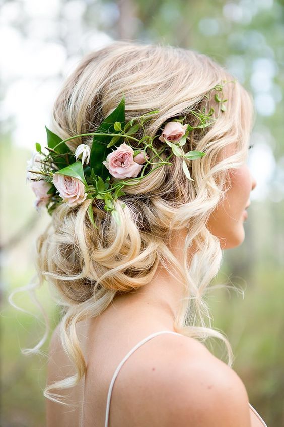 side swept updo with succulents and tiny flowers