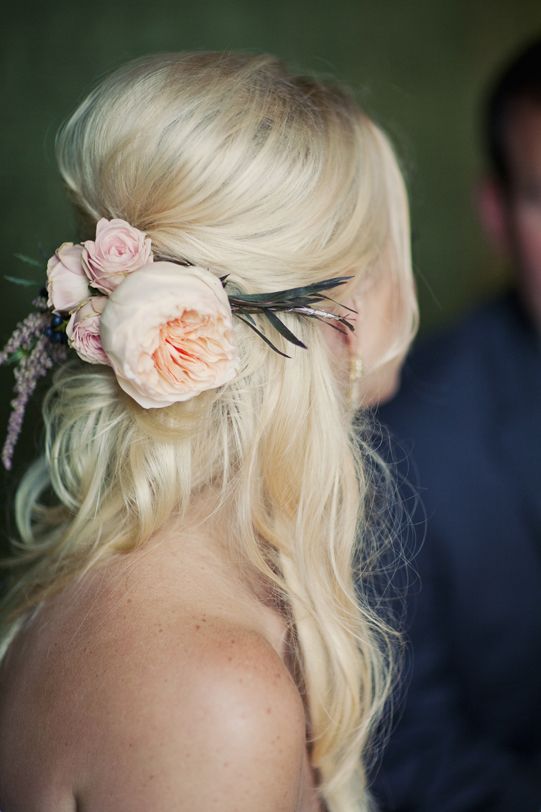 curly half updo with fresh white blooms
