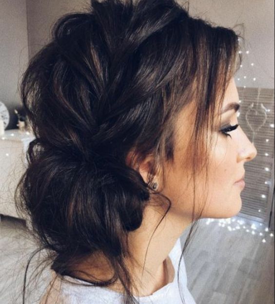 a low side chignon and a side bang with a bit of waves will make your bridal look ultimately sophisticated