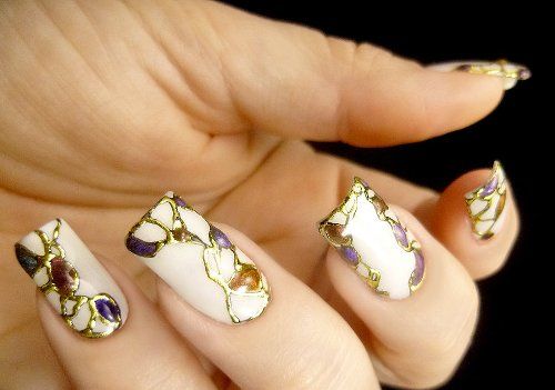abstract gold foiled nail art design