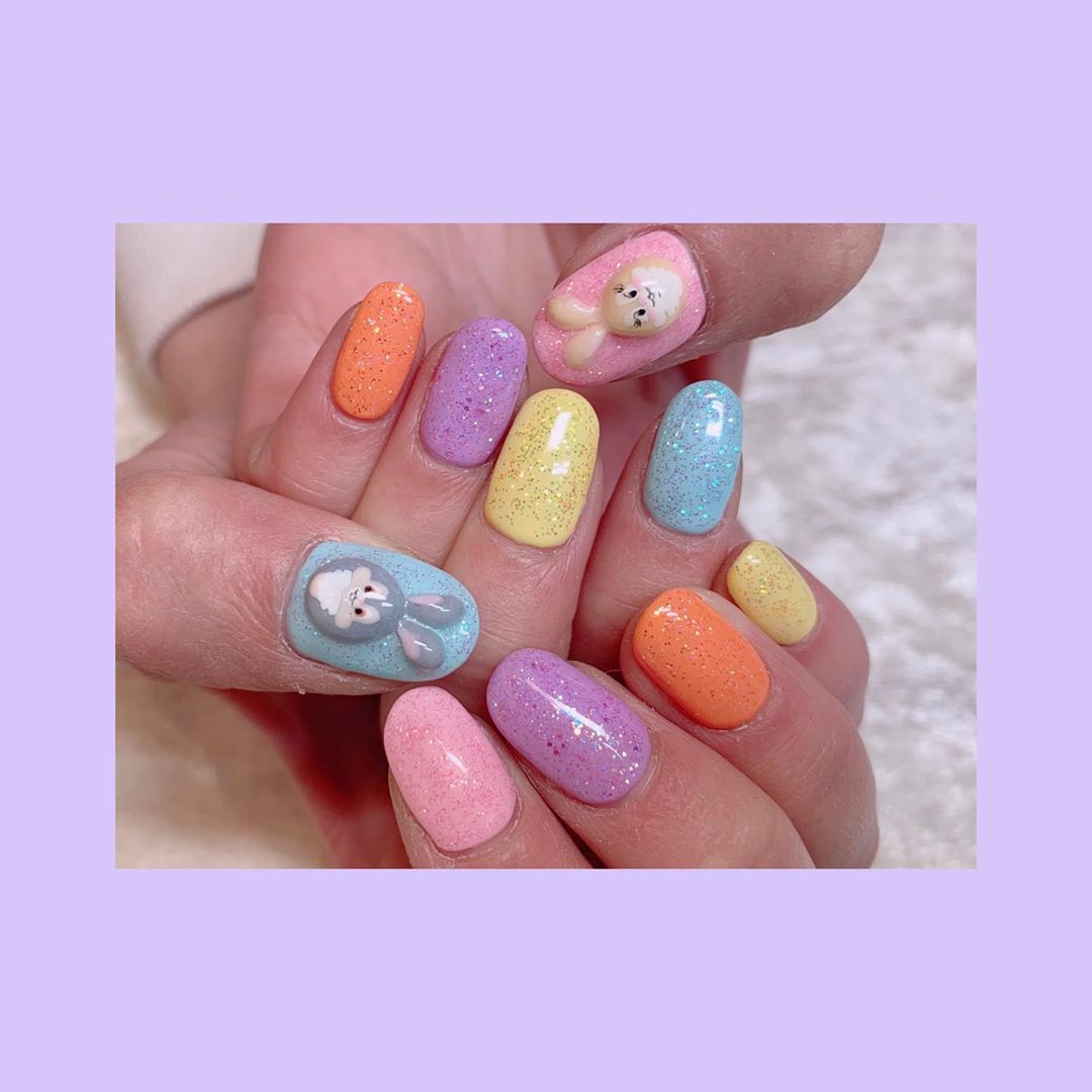 Colorful Nails with Bunny Design on Thumb