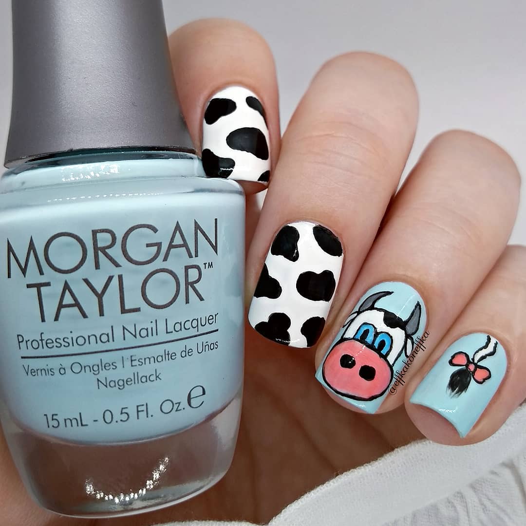 Blue Nail Color with Cow Design