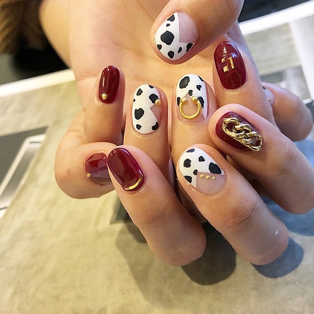 Brown and Cow Design Nail Art with Nails Jewels