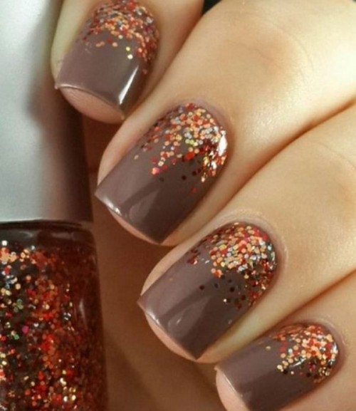 a burgundy manicure with a gold glitter accent nail is classics for a fall bride