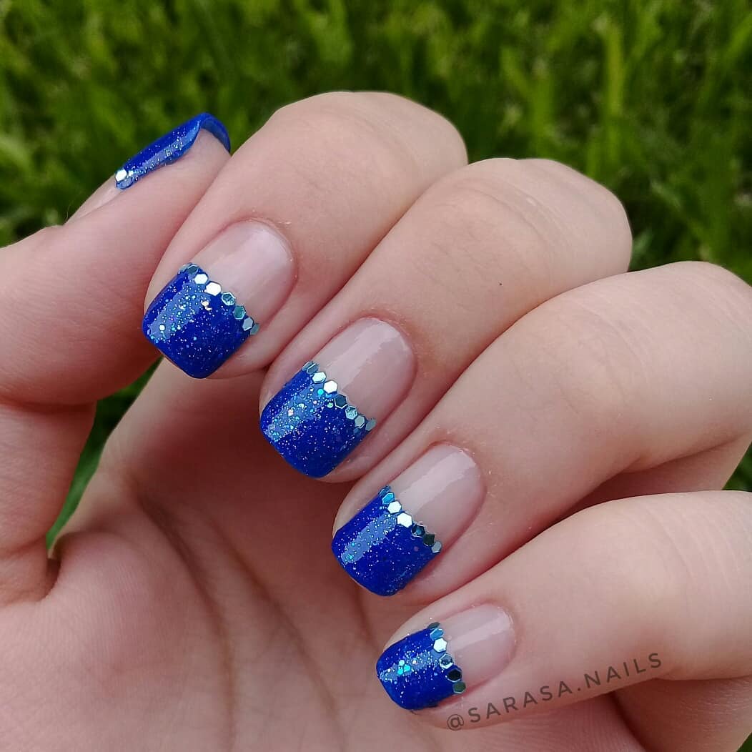 Glittery Blue Tips with Neutral Nails and Silver Beads
