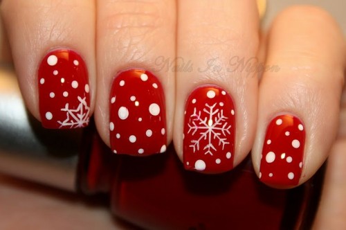bold red nails with a geometric rhinestone touch for a winter holiday wedding