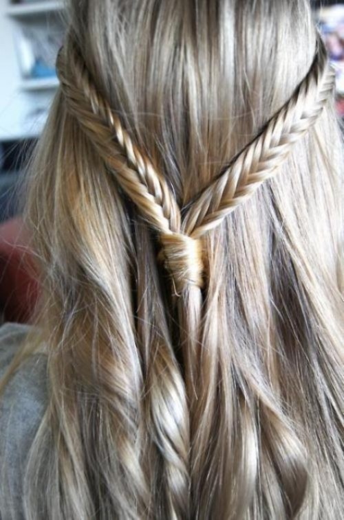 a messy and dimensional braided updo with some locks down is a picture-perfect option that will last long