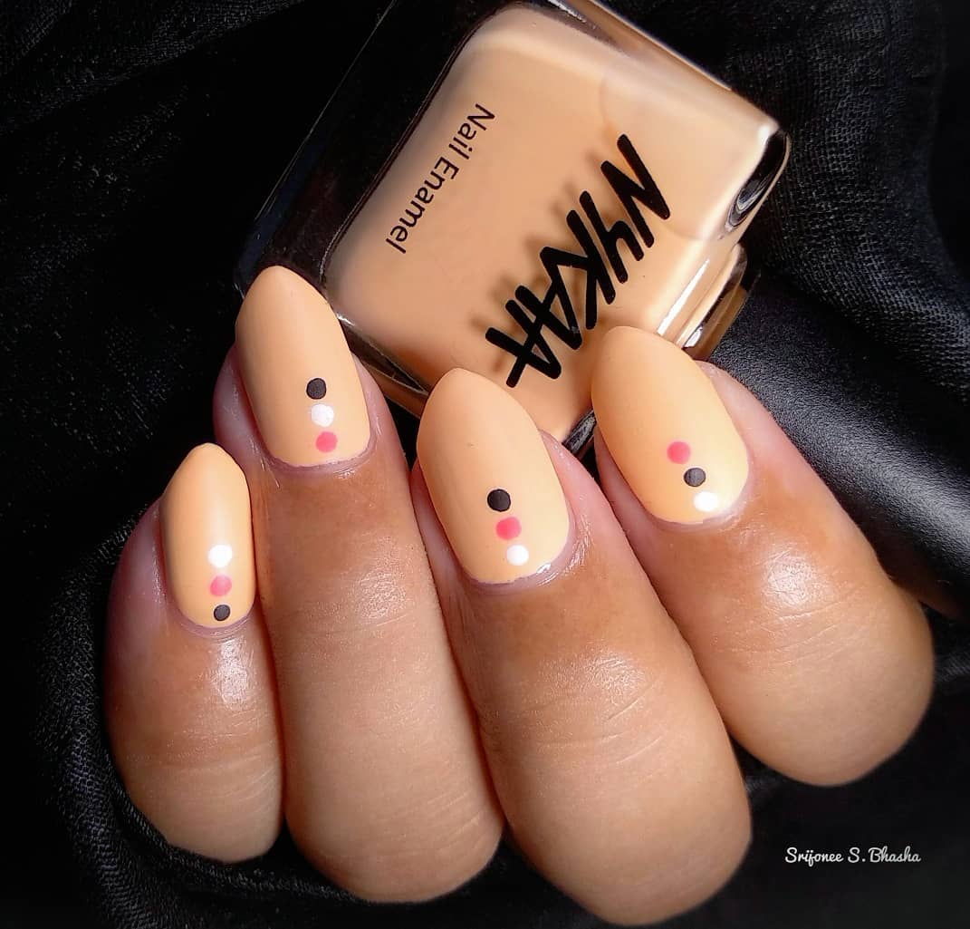 Peach Stiletto Nails with Three Dotted Nail Art Design