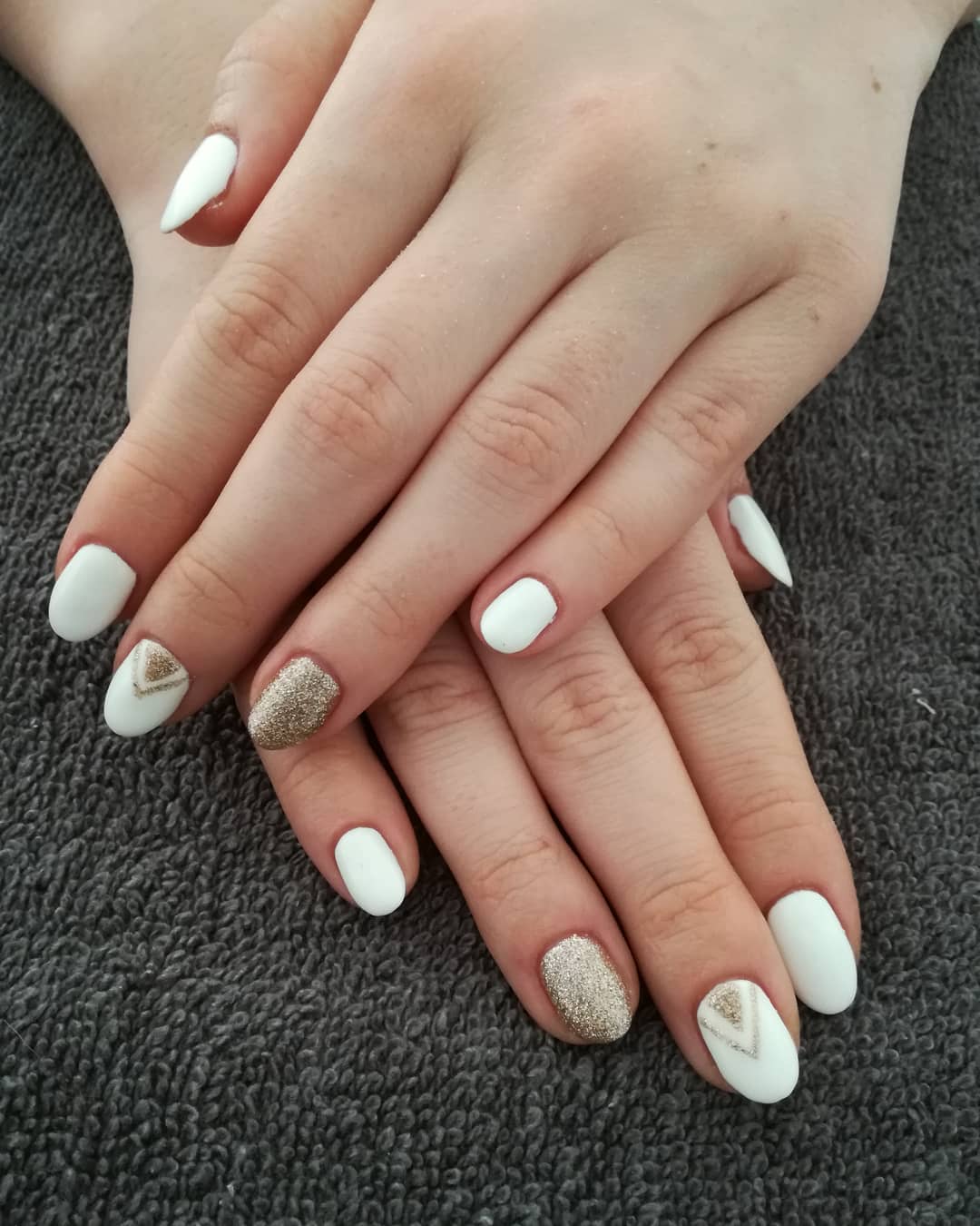 Fashionable White Nails with Golden Nail Art