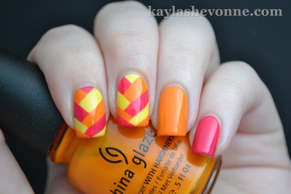 Bright braided summer manicure with yellow, pink, and orange
