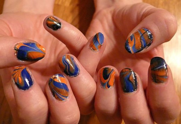 Blue and orange marbled nails