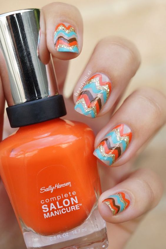 Orange and coloured chevron nails