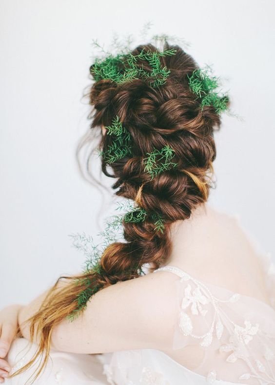 chic curly updo with a beaded hairpiece and curls around