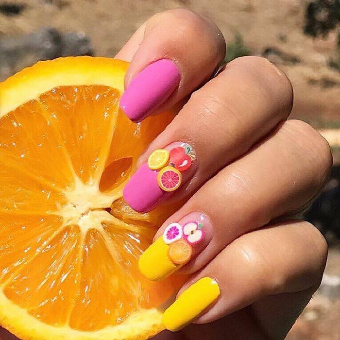 The Fruit-Themed Manicure is the Ultimate Summer Nail Trend yellow and pink fruit nails